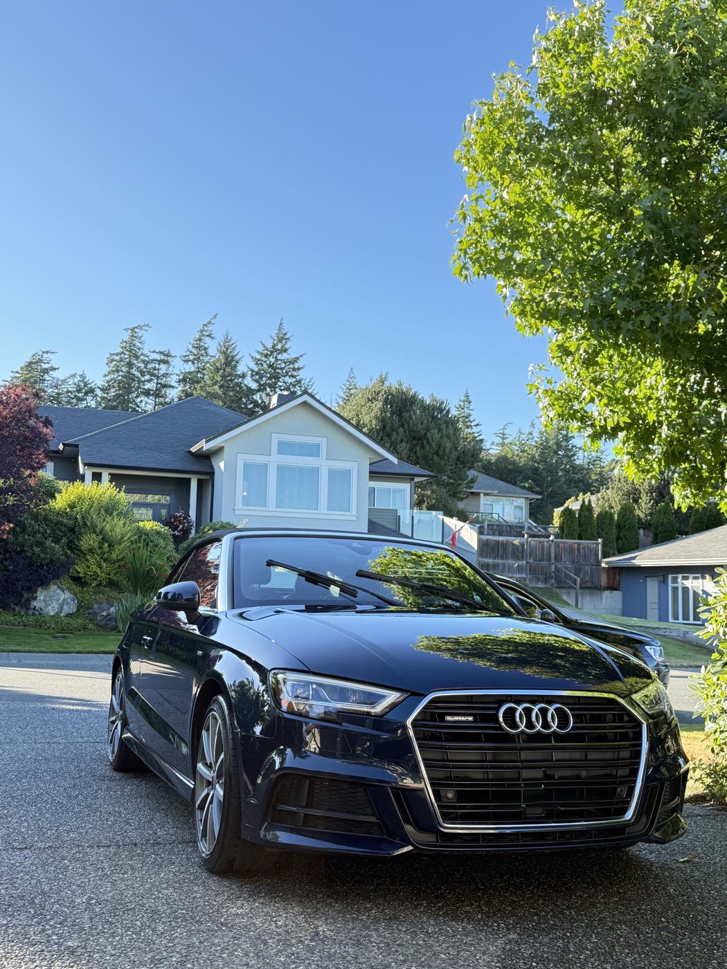 Freshly detailed Audi convertible in a Kelowna driveway