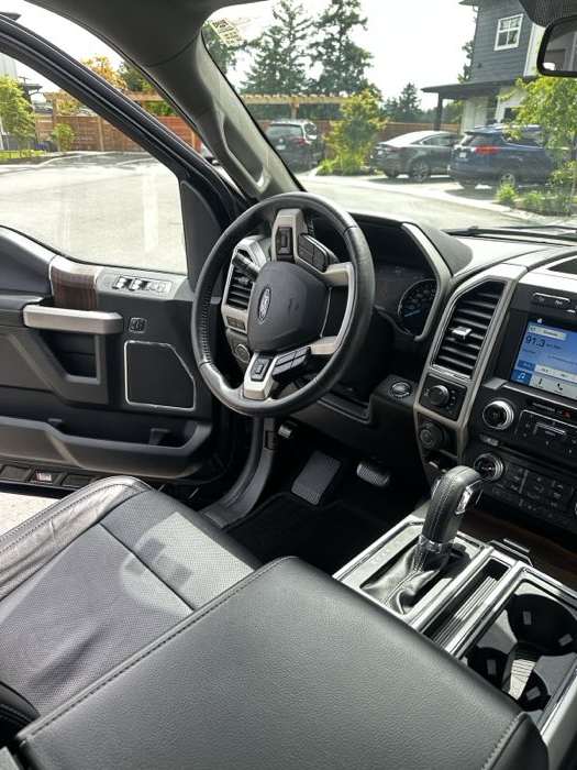 Shampooed seats and clean centre console after mobile detailing in Kelowna, BC