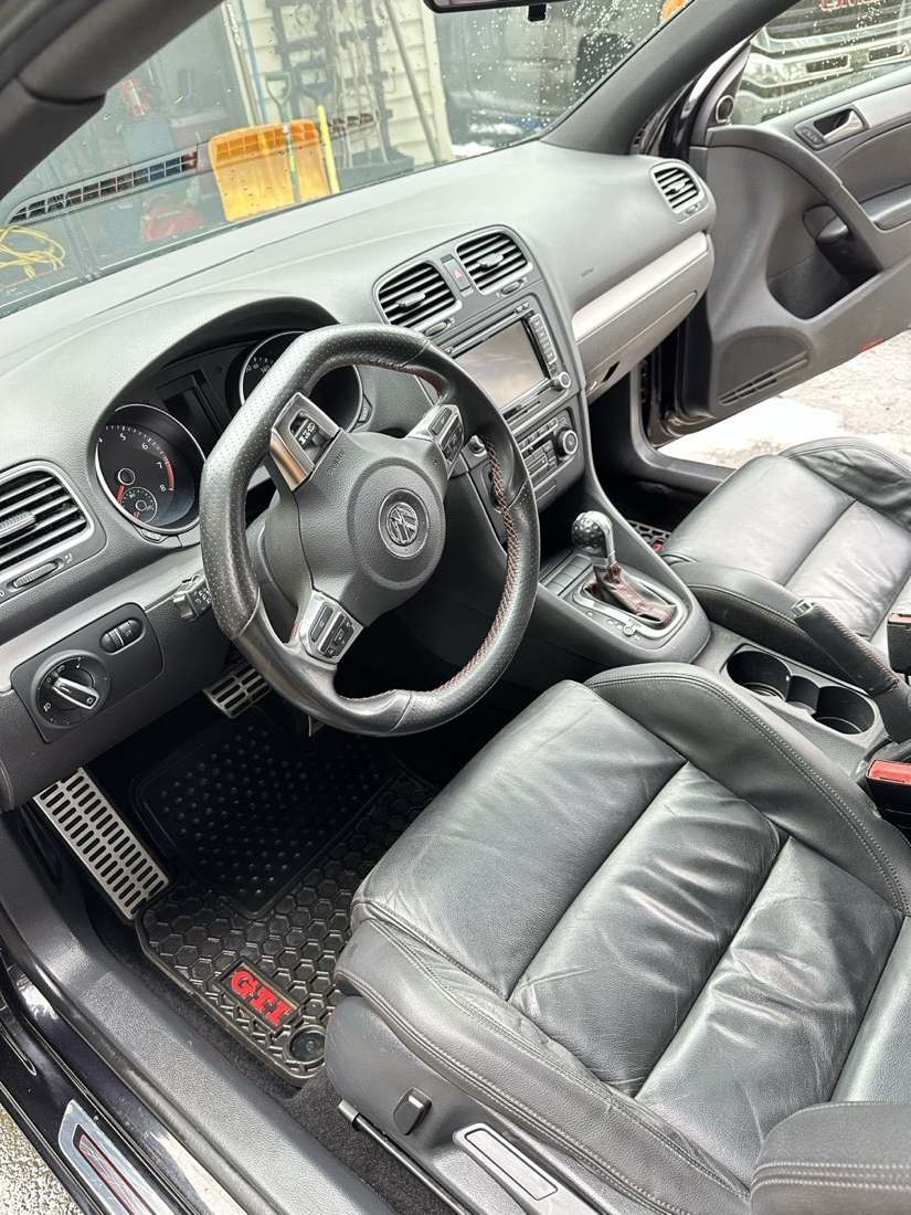 VW Golf interior after detailing — clean seats and sill