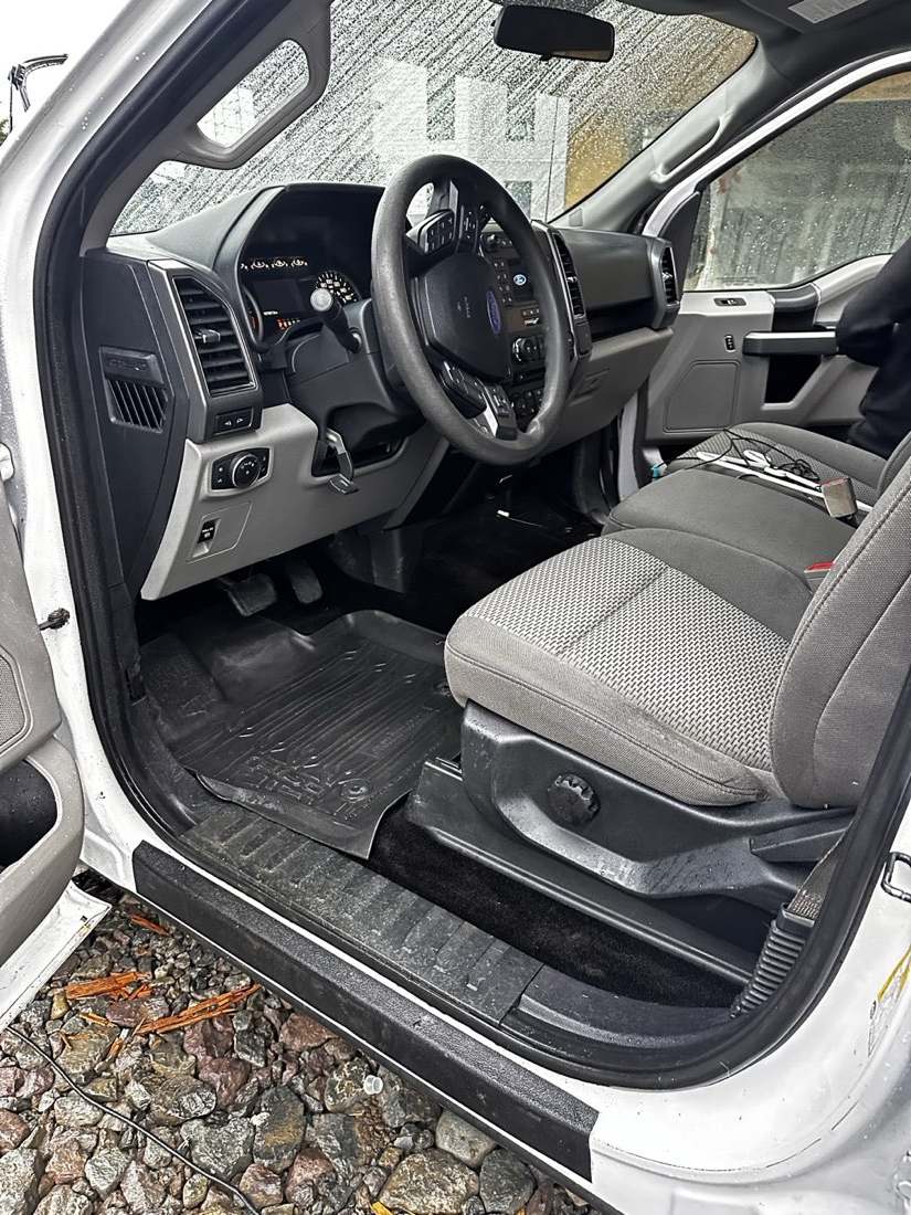 Truck interior after detailing — clean seat and sill